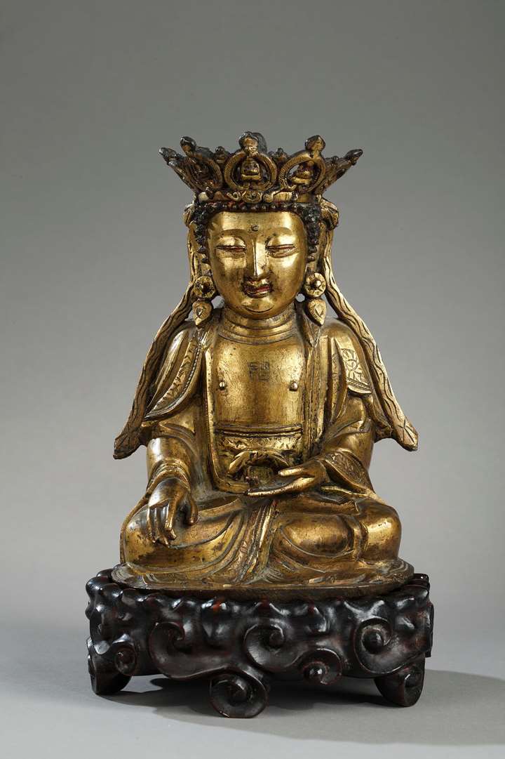 Figure of Bodhisattva  Gold bronze and sitting in padmasana  the hands in bhumisparsa mudra 